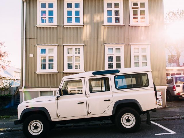 Land Cruiser in front of building