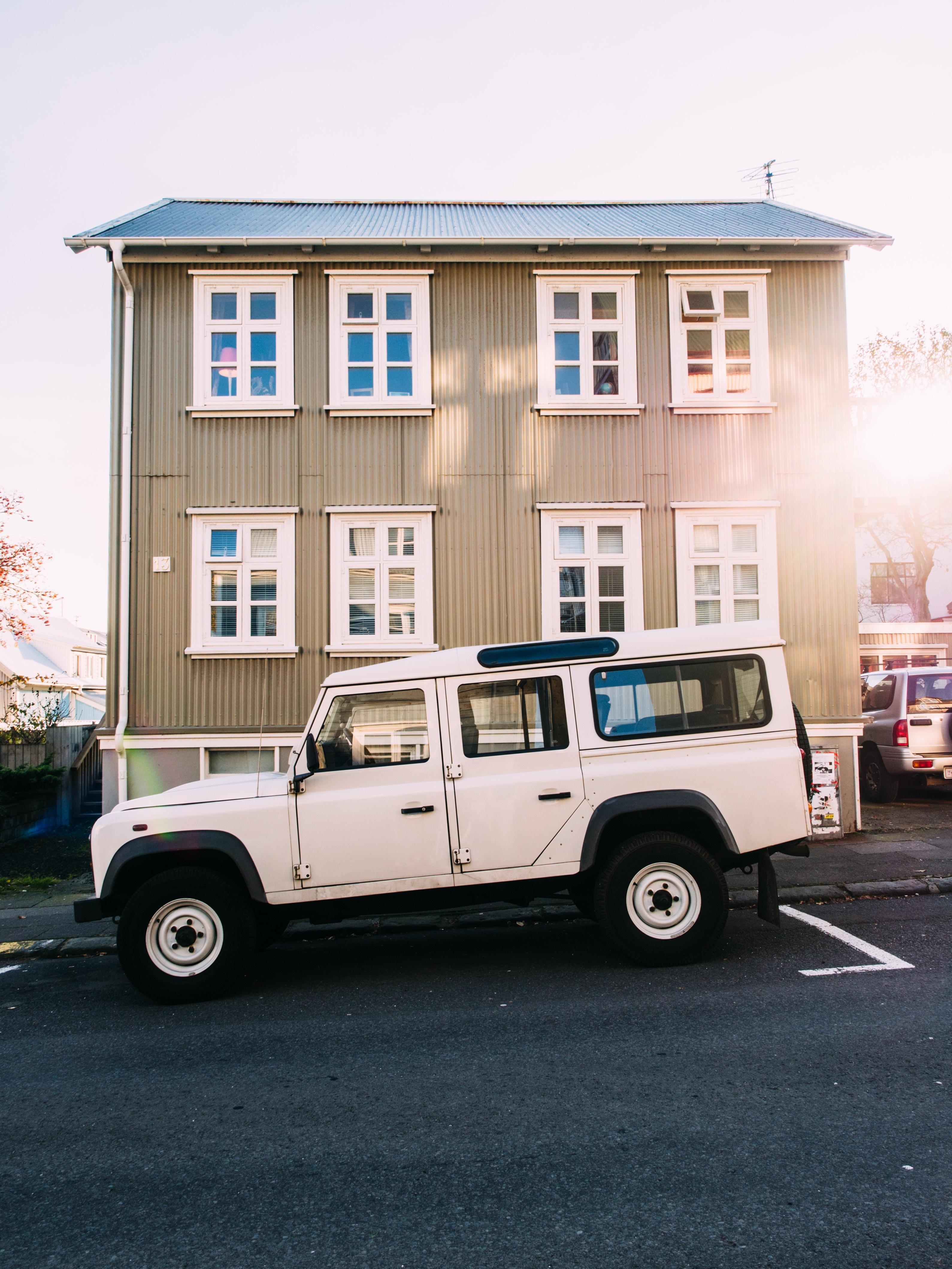 Land Cruiser in front of building