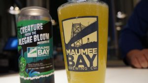 A glass and can of beer from Maumee Bay Brewery 